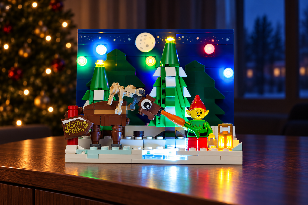 LEGO® Santa's Front Yard 40484 with the Game of Bricks lights in a festive room