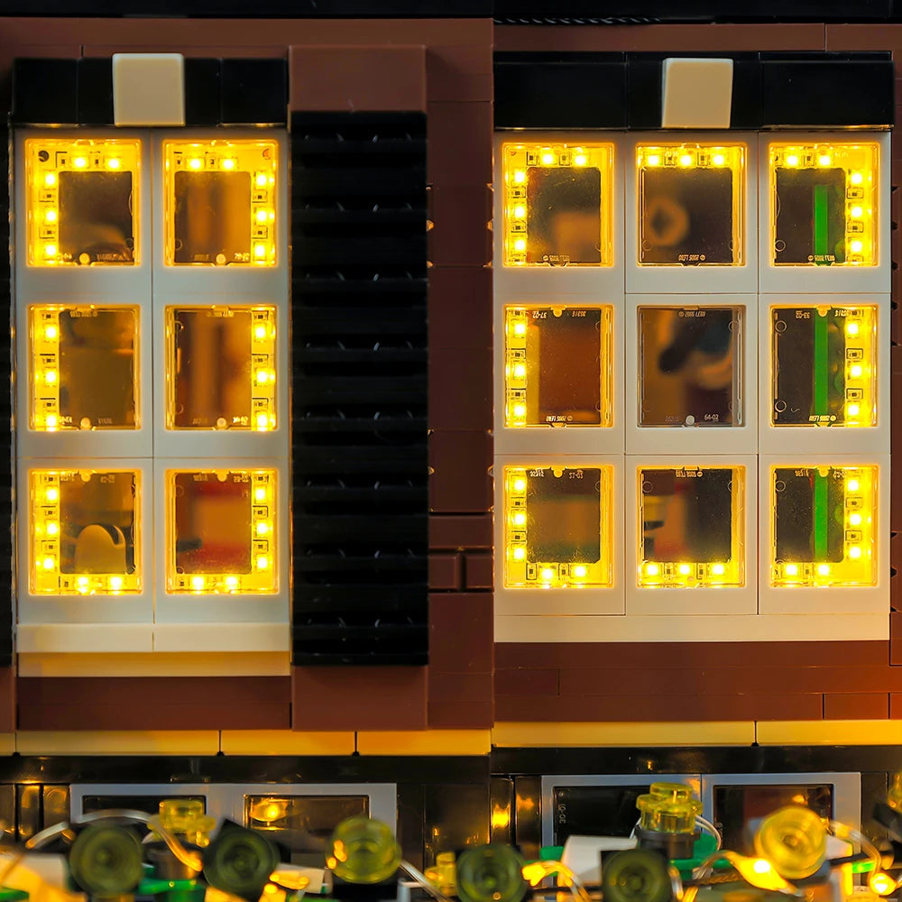 Close-up of warm LED lights around a window in the McCallister house