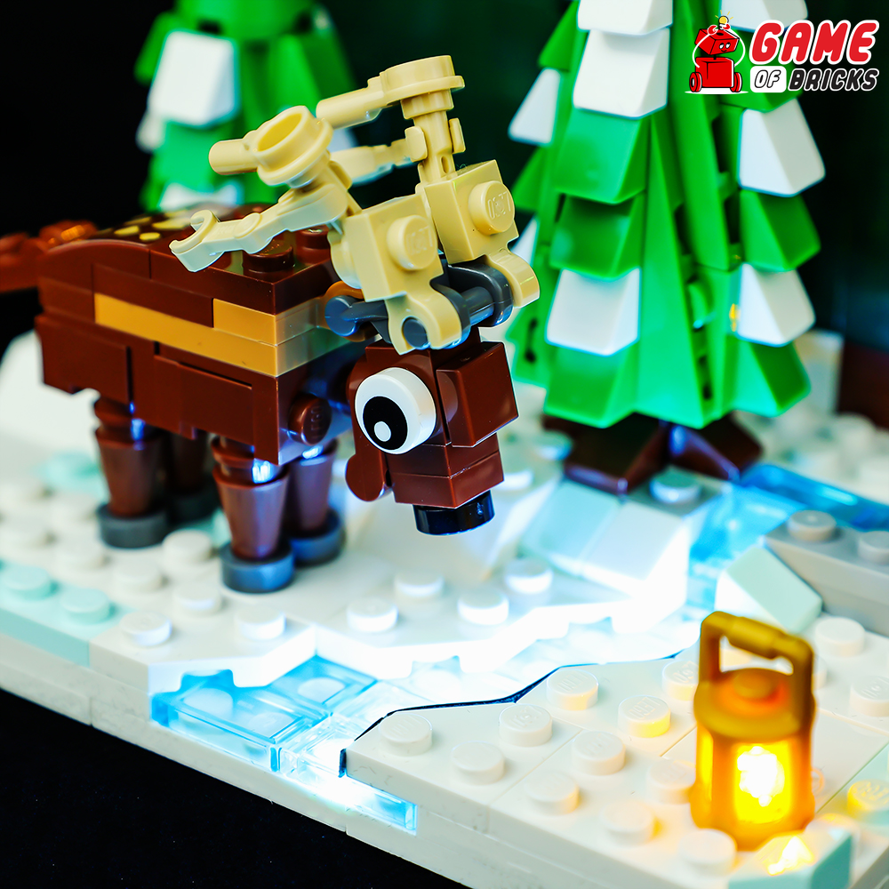 Reindeer beside the elf in Santa's Front Yard