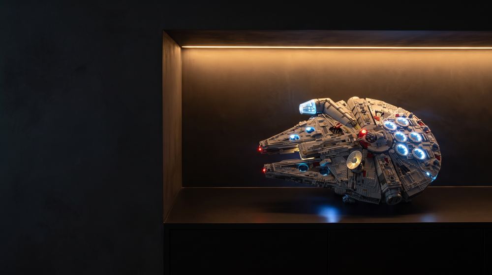 LEGO® Millennium Falcon 75192 lit with a Game of Bricks light kit, in a wall niche