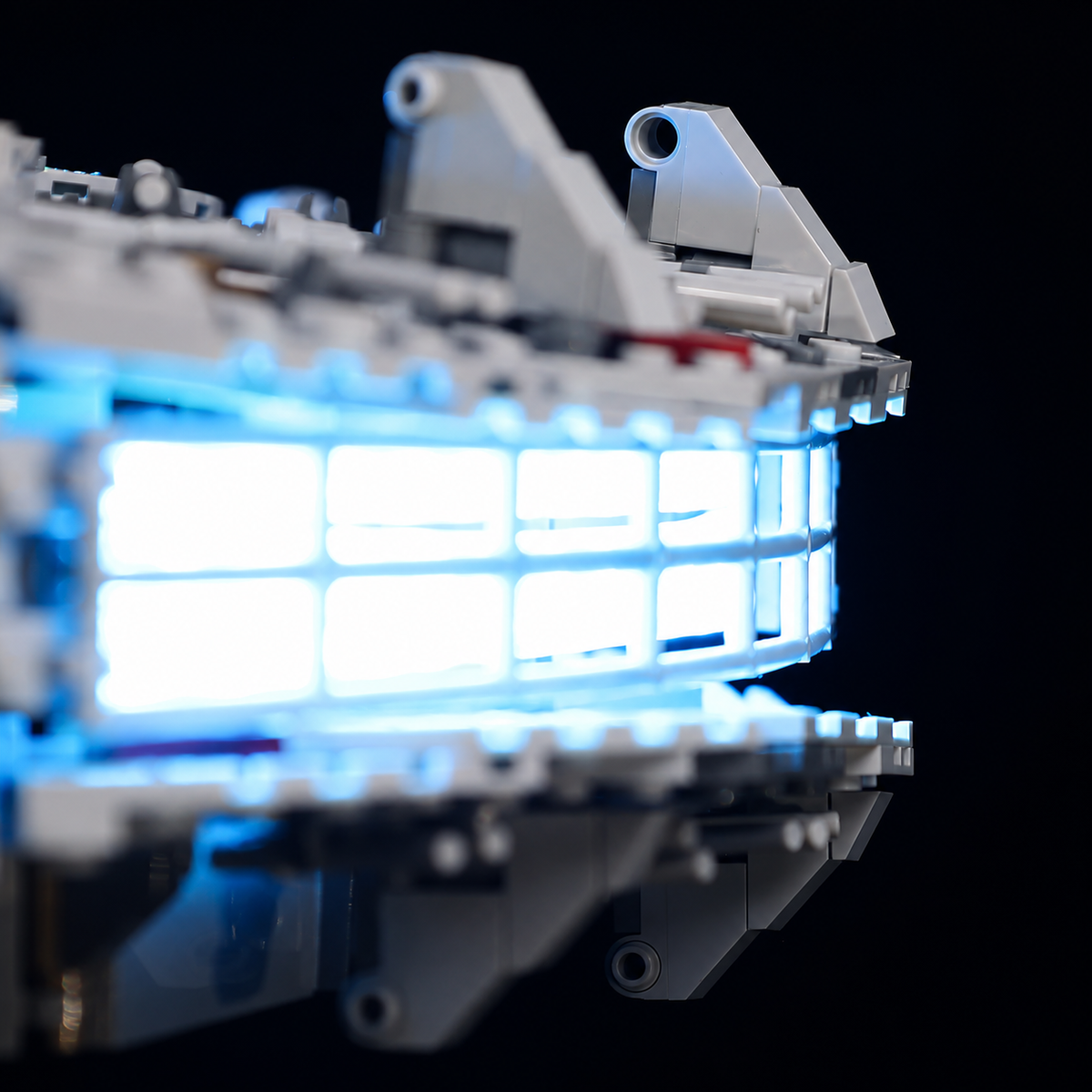 Side detail of the bright blue-white rear engine strip on LEGO Millennium Falcon 75192.