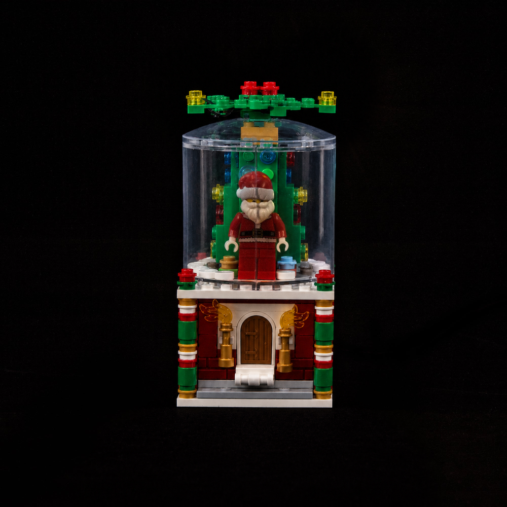 LEGO® Snowglobe 40223 with Game of Bricks Lights switched off, matching the main product photograph.