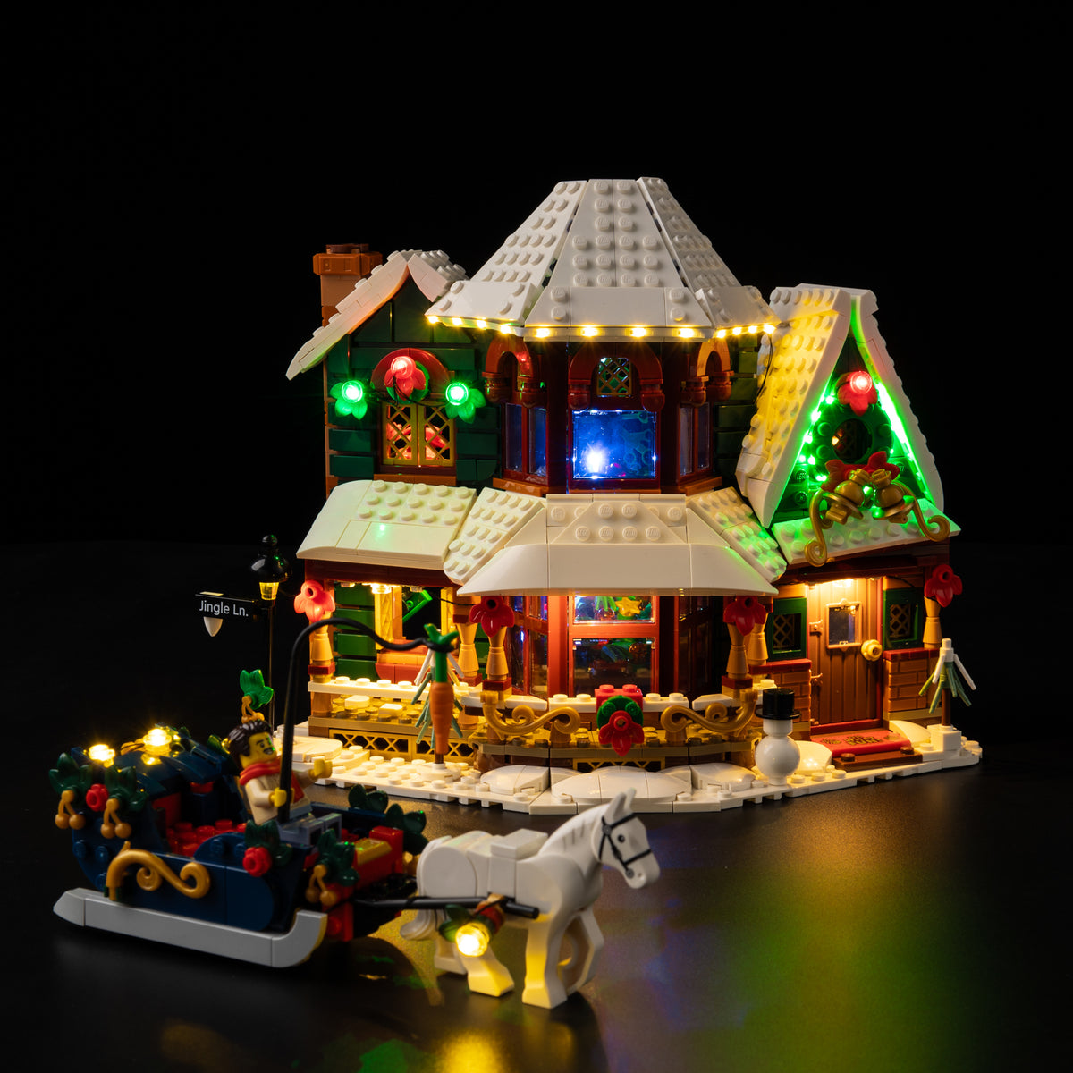 Holiday House lit at night with the Light Kit for LEGO® Holiday House 11387