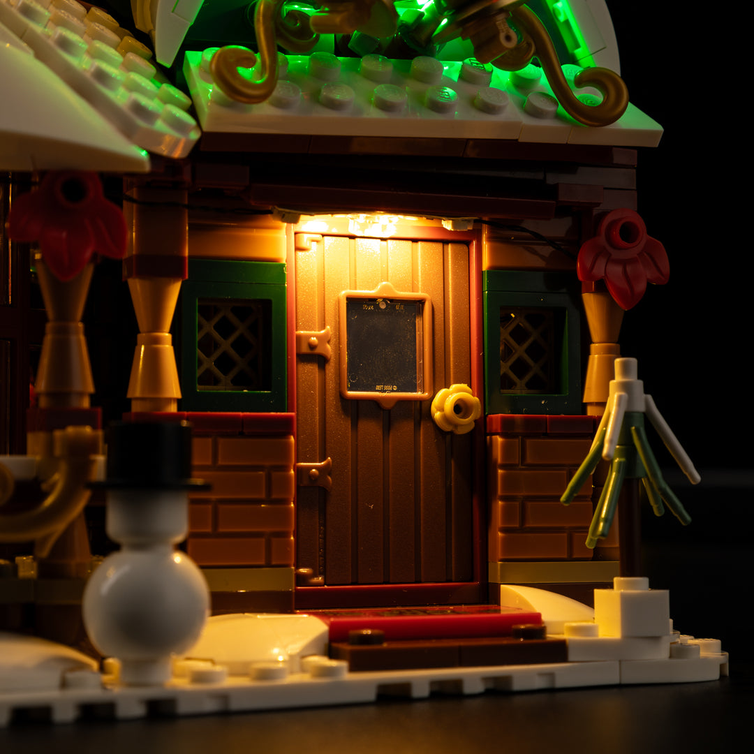 Golden-lit porch and doorway on the Light Kit for LEGO® Holiday House 11387