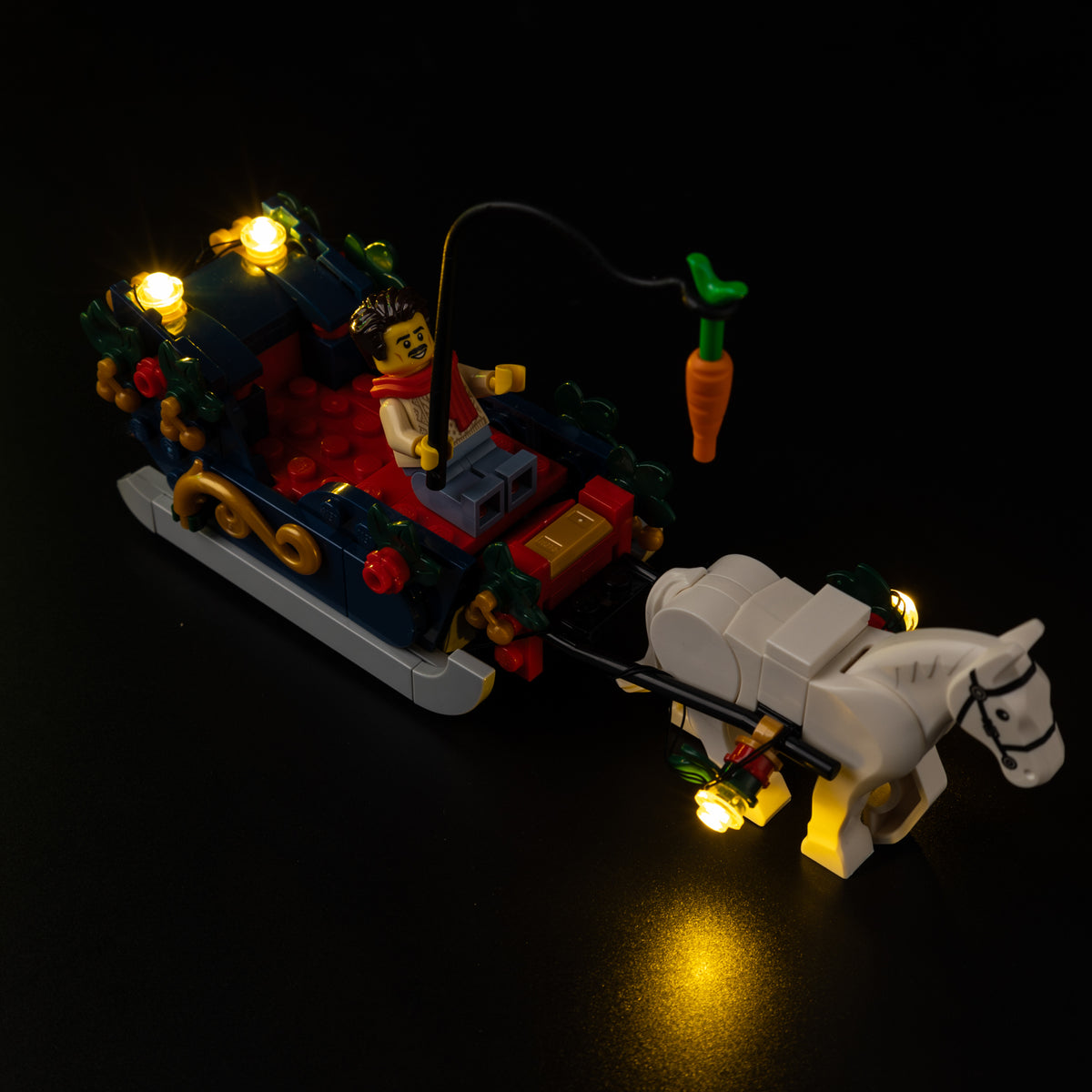 Lit horse-drawn sleigh lanterns on the Light Kit for LEGO® Holiday House 11387