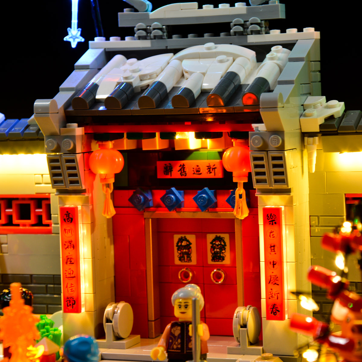 LEGO® Story of Nian 80106 light kit: decorated gate roof, red banners and hanging firecrackers.