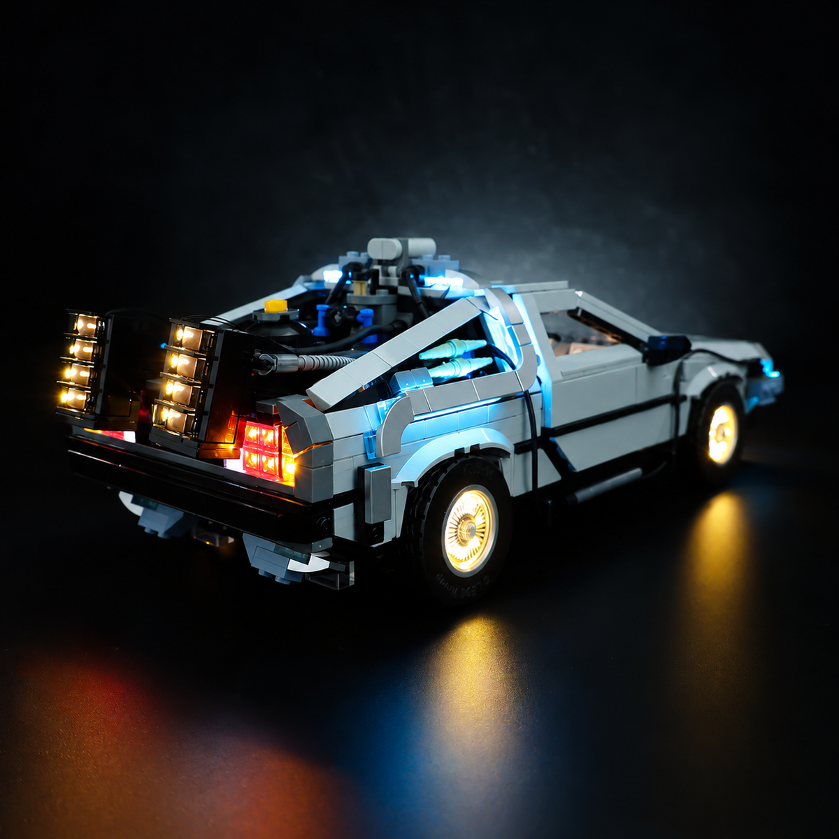 LEGO® Back to the Future Time Machine 10300 from the rear with illuminated wheels and tail lamps